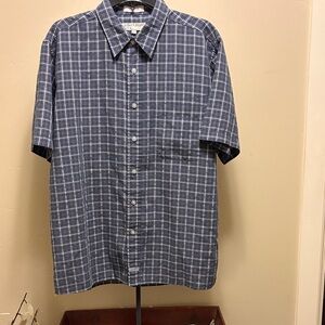 Eighty Eight short sleeve button up collared shirt.